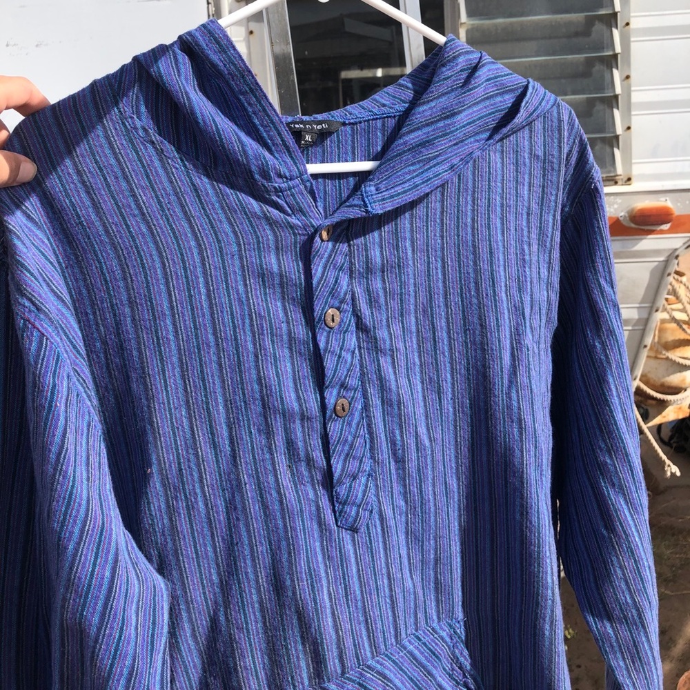 Thin poncho style long sleeve.
